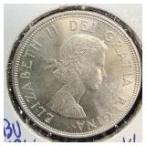 Bright uncirculated 1964 silver Canadian dollar