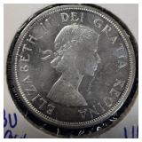 Bright uncirculated 1964 silver Canadian dollar