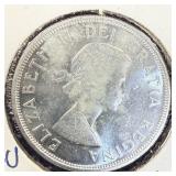 Bright uncirculated 1964 silver Canadian dollar