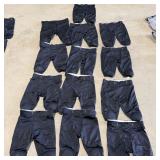(13) Riddell Adult Practice Football Pants with