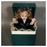 Small vintage porcelain doll green velvet dress >
