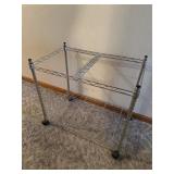 Rolling luggage rack 25ï¿½ x 23ï¿½ x 15ï¿½