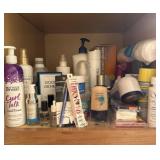 Shelf full of personal care and makeup items new