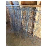 Large stack of wire garden trellis