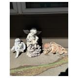 3 cherub Yard statues