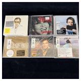 New sealed CDs Elvis, Elton John, Johnny Cash,