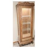 Beautiful solid oak lighted curio cabinet