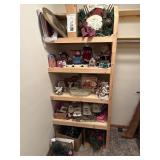 Contents of shelving unit Christmas decor lots of