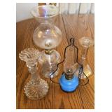 Vintage oil, lamps, and candlestick holders