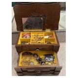 Vintage jewelry box filled with jewelry