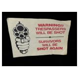 Paper Warning trespassers will be shot