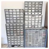 Six sets of storage drawers with miscellaneous >