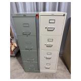 Two metal four drawer upright filing cabinets 52ï¿½