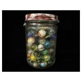 Jar of vintage marbles