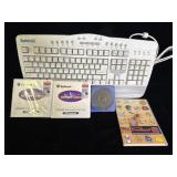 vintage Systemax computer keyboard accompanied by