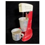 vintage red and white electric drink mixer,
