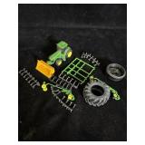 collection of miniature plastic John Deere farm