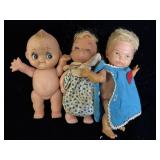 three vintage rubber or vinyl Kewpie-style baby