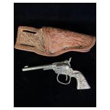 Very early western pony toy gun with leather