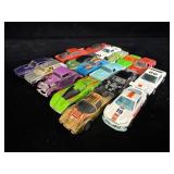 collection of vintage plastic toy cars, appearing