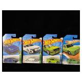 (4) 1:64 scale hot wheels cars Tesla model Y,