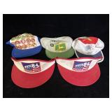 collection of five vintage hats and visors from