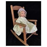 1999 Phyllis Parkins baby doll in vintage wooden