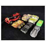 collection of seven vintage toy vehicles