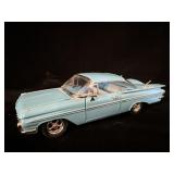 light blue 1959 Chevrolet Impala Sport Coupe
