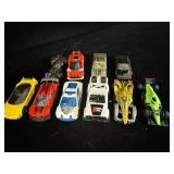 collection of loose die-cast toy cars