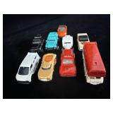collection of loose die-cast toy cars