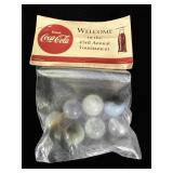 vintage packet of Coca-Cola advertising marbles