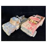 two vintage pressed-steel toy pickup trucks 1990s