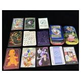 Stack of Pokï¿½mon & one piece gundam trading cards