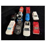 collection of loose die-cast toy cars