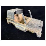 vintage pressed-metal toy truck cab and chassis
