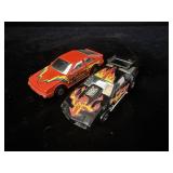 2 vintage Hot Wheels Flip Outs die-cast cars