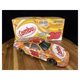 Elliott Sadlerï¿½s #38 Combos Ford Taurus Action