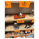 Santa + elf in diecast corvette