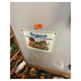 Vintage metal candy sign