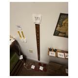 Antique automotive supply store yard stick