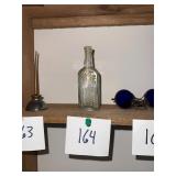 Antique quackery bottle