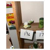 Vintage porcelain bird on flowers