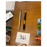 Pair of vintage nude women pin up press