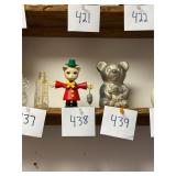 Vintage wind up cat holding mouse toy