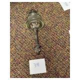 Antique railroad glass insulator with support