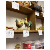 Pair of rooster figurines / never