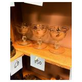 Lot of 3 gold trimmed goblet glasses