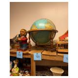 Vintage lighted world globe on stand / working