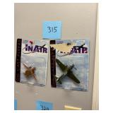 Pair of vintage NOS die cast airplanes